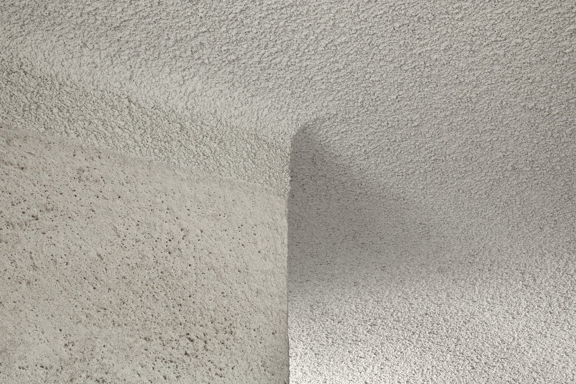 Matteo Brioni's coarse-grained clay plaster MultiTerra Structured Custom color for the walls of a private house in Bolzano by Pedevilla Architects, photo by Josef Gostner