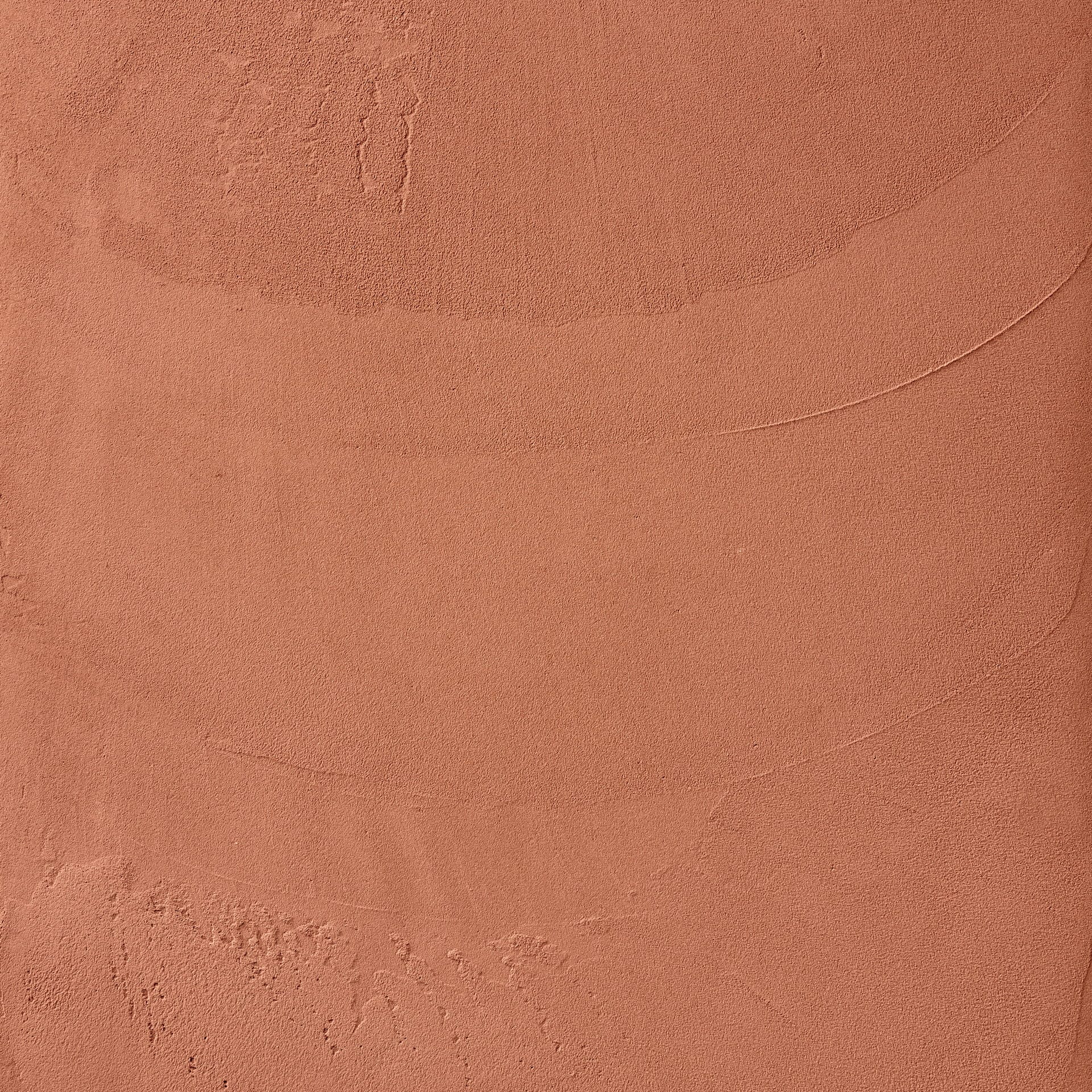 Fine-grained clay plaster TerraVista Smooth Melograno, pomegranade color, produced by Matteo Brioni