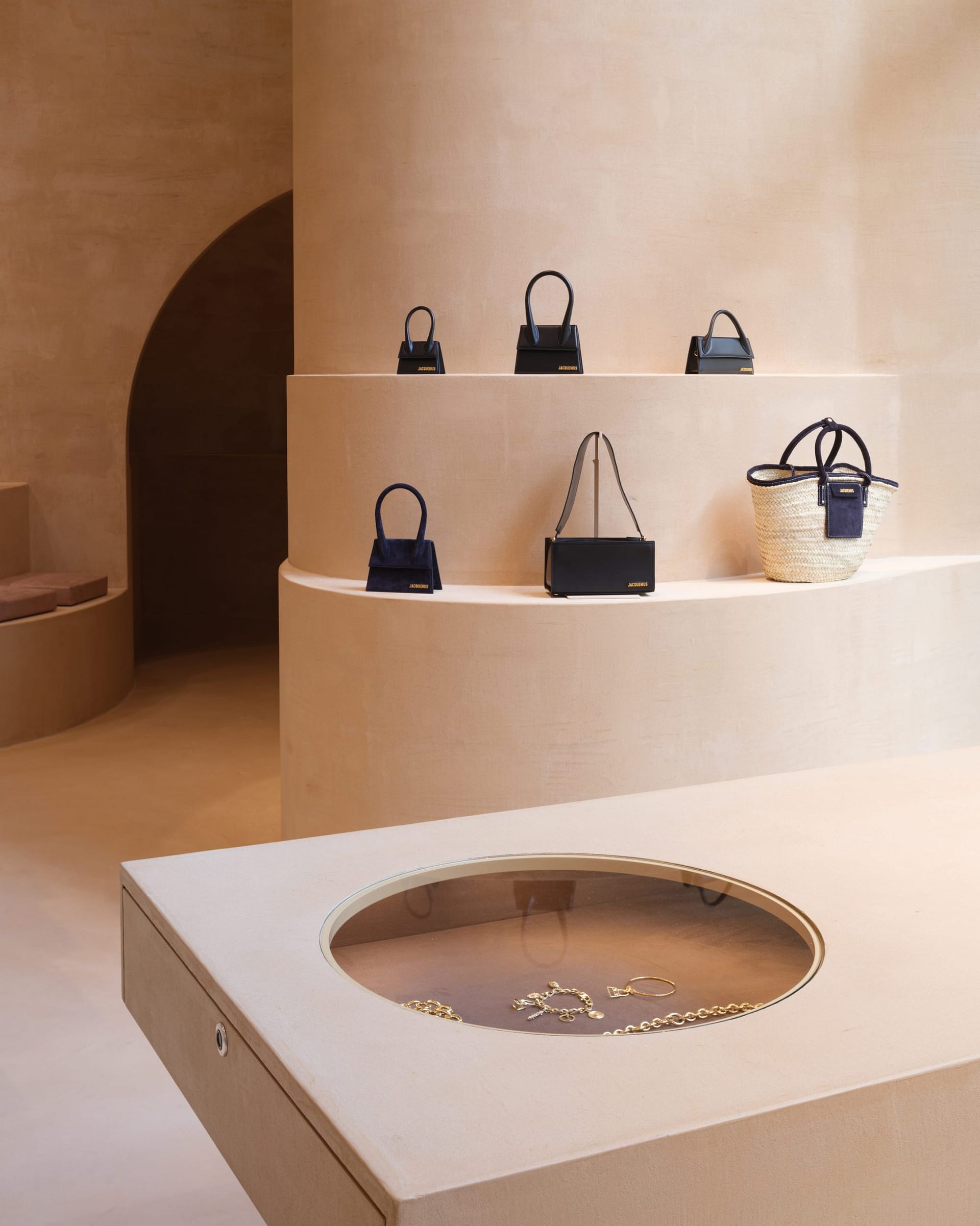 Fine-grained mixtures of clays and mineral binders TerraTon Floor and TerraTon Plus Wall both Smooth and with the same bespoke color applied to floor, walls and shelves of Jaquemus boutique into the London Selfridges. Project by AMO-OMA. Photo by Lewis Ronald