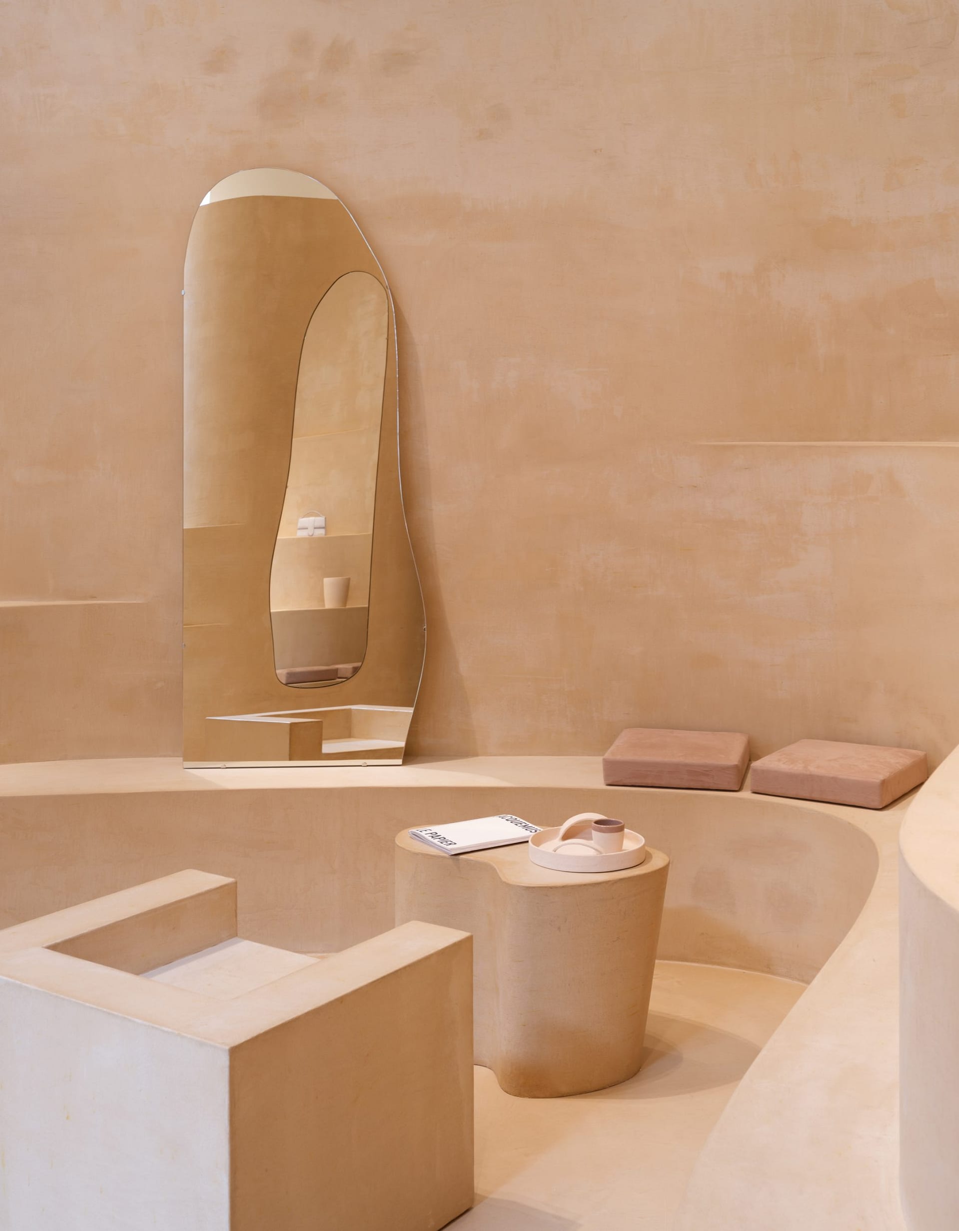 Fine-grained mixtures of clays and mineral binders TerraTon Floor and TerraTon Plus Wall both Smooth and with the same bespoke color applied to floor, walls and shelves of Jaquemus boutique into the London Selfridges. Project by AMO-OMA. Photo by Lewis Ronald
